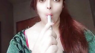 Beautiful housewife sucking and squeezing boobs