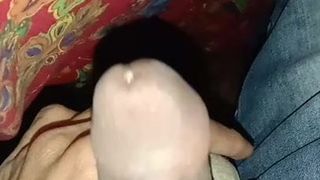 Masturbating