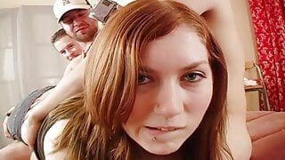 Young brunette gets fucked doggy style while sucking a second stud’s pole